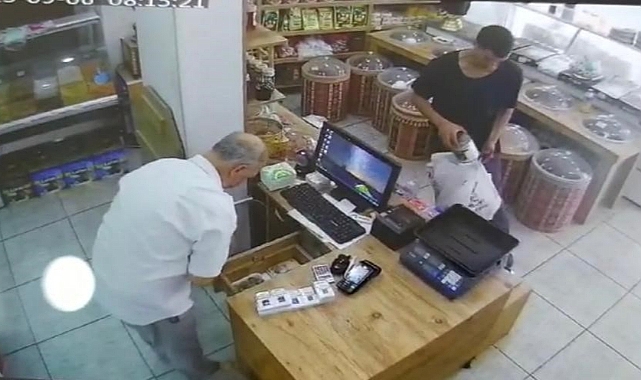 Alışveriş için girdiği dükkandan sadaka kutusunu çaldı