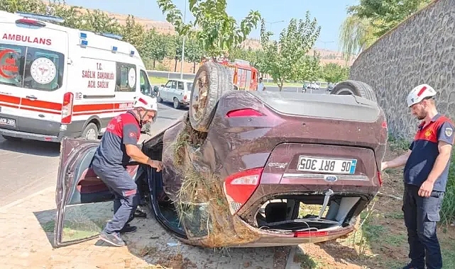 Karaköprü'de araç takla attı