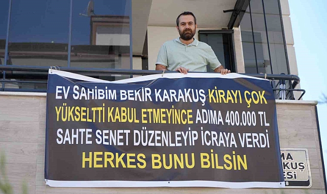 Ev sahibinin senetli kumpasına pankartlı tepki