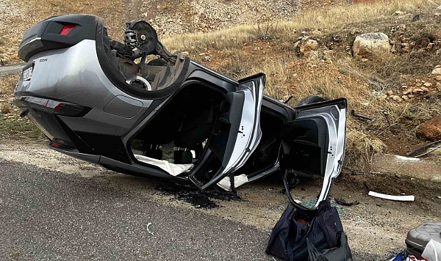 Otomobil ters döndü, sürücü yara almadan kurtuldu
