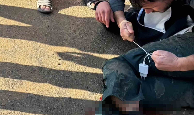Meydana gelen kazada yaralıya şarj kablosuyla turnike yapıldı