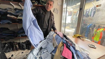 Ölen kişilerin kıyafetlerinin satıldığı mağazada sezon hazırlığı
