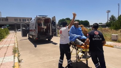 Çatıda yaktıkları ateşi söndürmeye çalışan çiftin vücudunda yanıklar oluştu