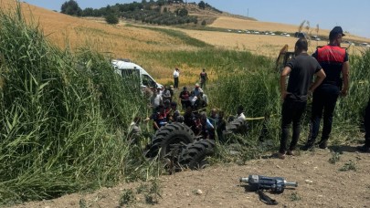 Yangını söndürmek isterken traktörün altında kaldı