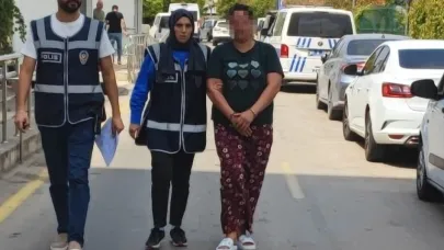 Kızını bıçakla kovalayan anne adliyede