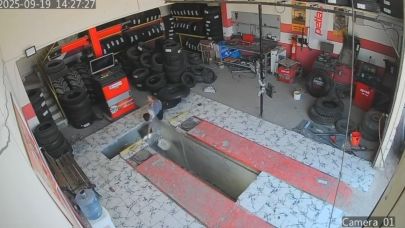 Oto lastikçide çocuğun çukura düşme anı