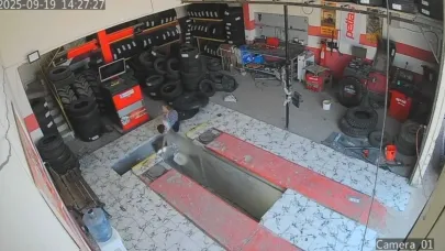 Oto lastikçide çocuğun çukura düşme anı