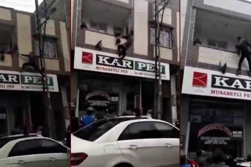Yürekleri ağza getiren an: Balkonda asılı kalan çocuğu kurtardı