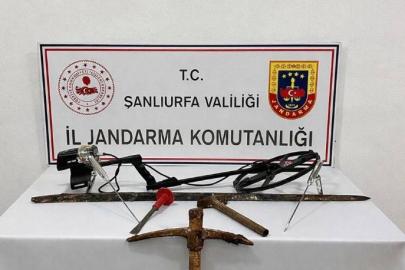 Bir evi silahla tarayan iki kişi yakalandı