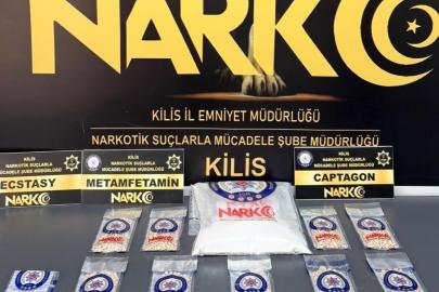 Mezarlıkta uyuşturucu hap ve metamfetamin ele geçirildi